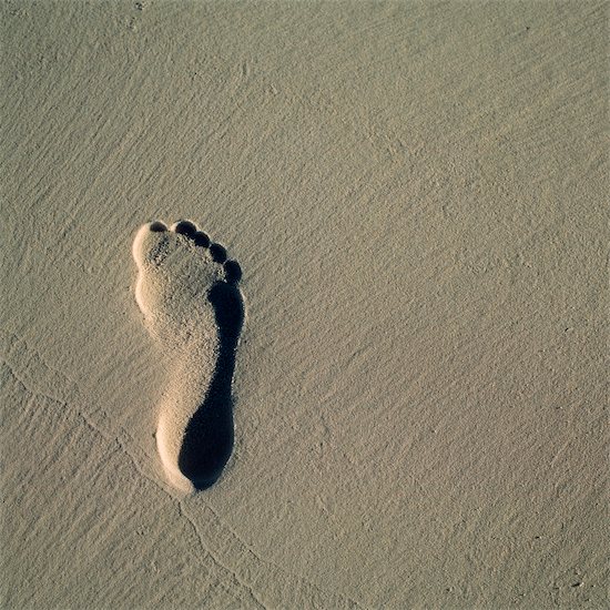 beach sand background. Foot Print in Beach Sand