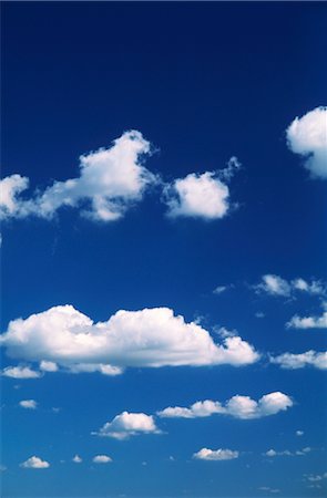 simsearch:600-02886000,k - White Clouds, Blue Sky Stock Photo - Premium Royalty-Free, Code: 600-02886115