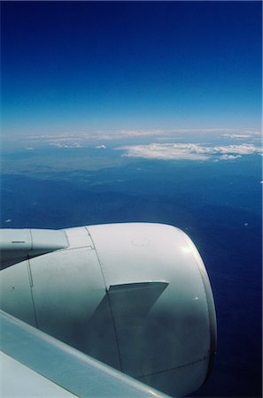 planes flying above the clouds - Jet Plane Engine Stock Photo - Premium Royalty-Free, Code: 600-02886463