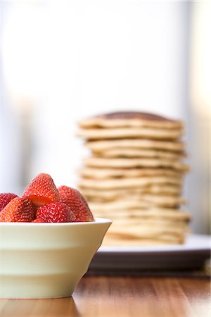 simsearch:600-02377945,k - Bowl of Strawberries and Stack of Pancakes Stock Photo - Premium Royalty-Free, Code: 600-02883071