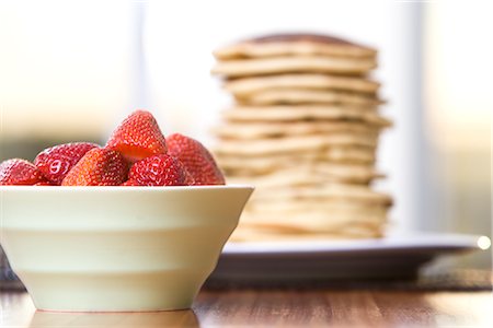 simsearch:600-02377945,k - Bowl of Strawberries and Stack of Pancakes Stock Photo - Premium Royalty-Free, Code: 600-02883072