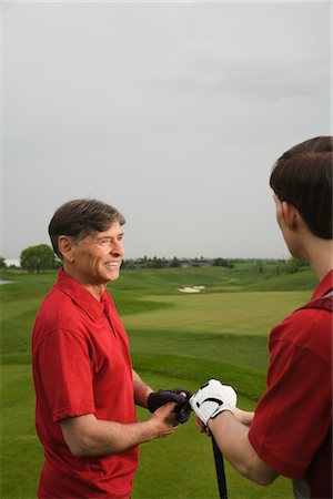 simsearch:600-02935461,k - Father and Son Golfing Stock Photo - Premium Royalty-Free, Code: 600-02883086