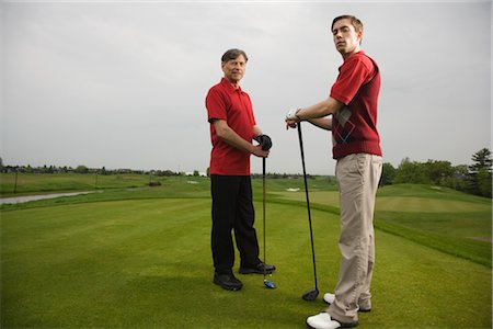 simsearch:600-02935461,k - Father and Son Golfing Stock Photo - Premium Royalty-Free, Code: 600-02883087