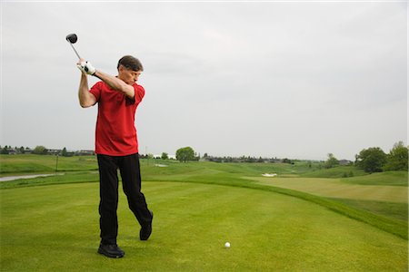 Man Golfing Stock Photo - Premium Royalty-Free, Code: 600-02883083
