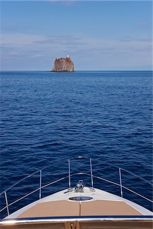 Bow of Abacus 52 Motorboat and Strombolicchio, Aeolian Islands, Sicily, Italy Stock Photo - Premium Royalty-Free, Code: 600-02912374