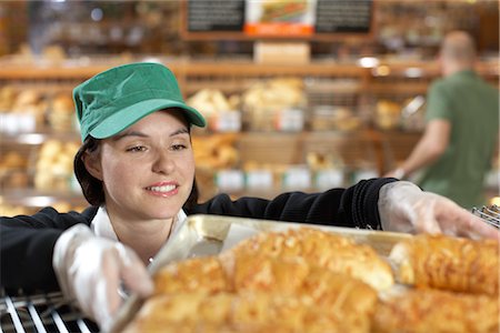 supermarket baker - Baker Handling Tray of Baked Goods Stock Photo - Premium Royalty-Free, Code: 600-02912440