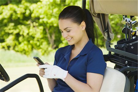 Woman in Golf Cart Stock Photo - Premium Royalty-Free, Code: 600-02935459