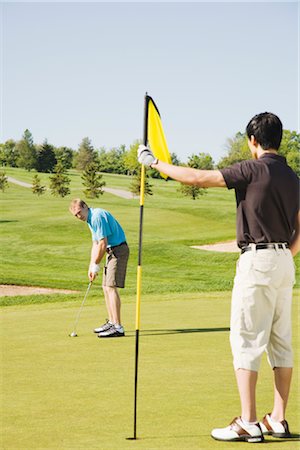 simsearch:600-02935461,k - Men Playing Golf Stock Photo - Premium Royalty-Free, Code: 600-02935479