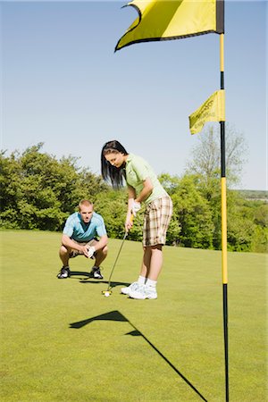 simsearch:600-02935461,k - Couple at Golf Club Stock Photo - Premium Royalty-Free, Code: 600-02935472
