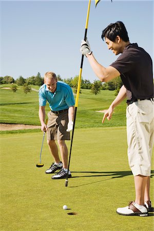 simsearch:600-02935461,k - Men Playing Golf Stock Photo - Premium Royalty-Free, Code: 600-02935481