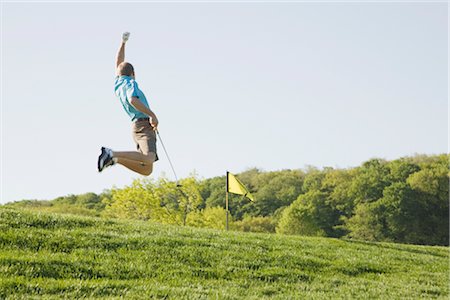 simsearch:600-02935461,k - Excited Golfer Jumping Stock Photo - Premium Royalty-Free, Code: 600-02935680