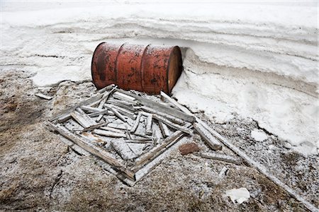 disposal - Fuel Barrel and Scrap Wood by an Abandoned RCMP Post and Post Office Stock Photo - Premium Royalty-Free, Code: 600-02943238