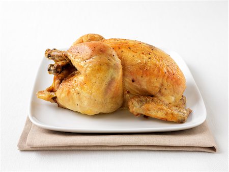 roasted (meat) - Roast Chicken on Platter Stock Photo - Premium Royalty-Free, Code: 600-02957584