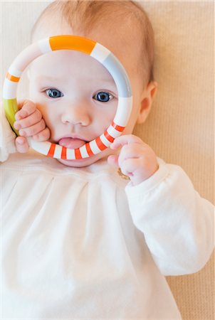 Baby with Teething Ring Stock Photo - Premium Royalty-Free, Code: 600-03003868