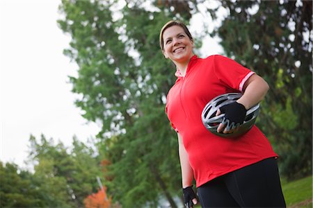 Portrait of Woman Ready to go Cycling, Seattle, Washington, USA Stock Photo - Premium Royalty-Free, Code: 600-03017965
