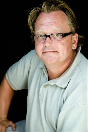 forty wrinkle - Portrait of Man Wearing Glasses Stock Photo - Premium Royalty-Free, Code: 600-03053982