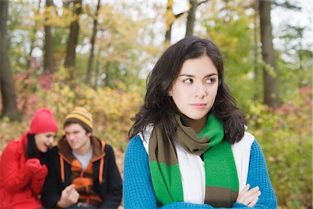 fall leaves teenagers - Woman Annoyed with Couple Stock Photo - Premium Royalty-Free, Code: 600-03075178