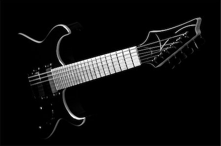 stringed instruments black background - Close-up of Guitar Stock Photo - Premium Royalty-Free, Code: 600-03152323