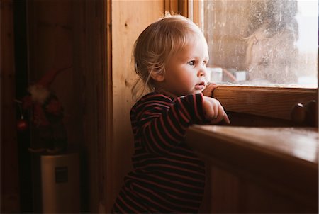 simsearch:600-02922776,k - Portrait of Girl Looking out of Window Stock Photo - Premium Royalty-Free, Code: 600-03152398