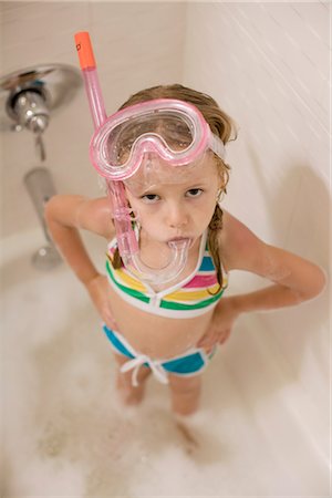 Girl with Snorkel in Bathtub Stock Photo - Premium Royalty-Free, Code: 600-03152945