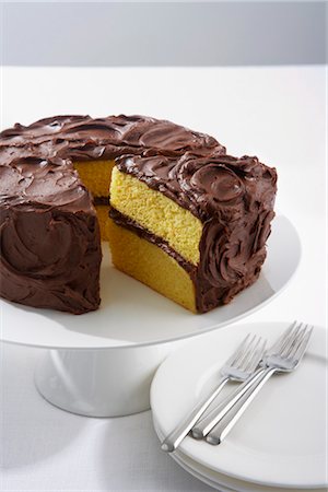 Cake with Chocolate Icing Stock Photo - Premium Royalty-Free, Code: 600-03194969