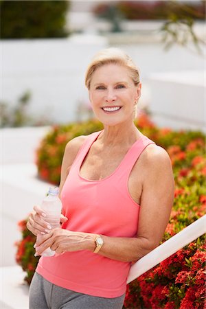 Portrait of Woman Drinking Bottled Water Stock Photo - Premium Royalty-Free, Code: 600-03227495