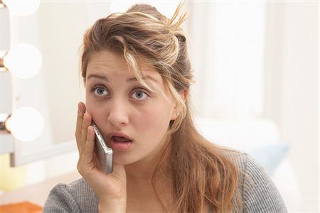 simsearch:600-03244230,k - Close-up of Woman Talking on Cell Phone Stock Photo - Premium Royalty-Free, Code: 600-03244229