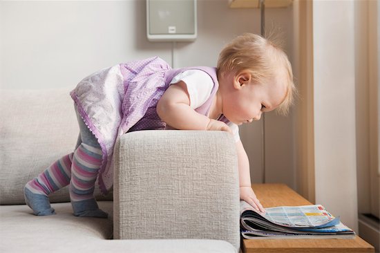 Cartoon Girl Looking. Baby Girl Looking at Newspaper