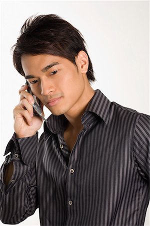 Man Using Cell Phone Stock Photo - Premium Royalty-Free, Code: 600-03333322