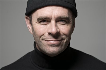 Portrait of Man in Black Cap Stock Photo - Premium Royalty-Free, Code: 600-03404576