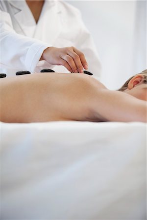 side (anatomy) - Woman Having Hot Stone Massage Stock Photo - Premium Royalty-Free, Code: 600-03405627