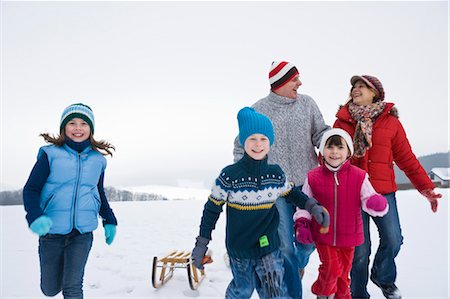 simsearch:400-05309800,k - Family having Fun Outdoors in Winter Stock Photo - Premium Royalty-Free, Code: 600-03406328