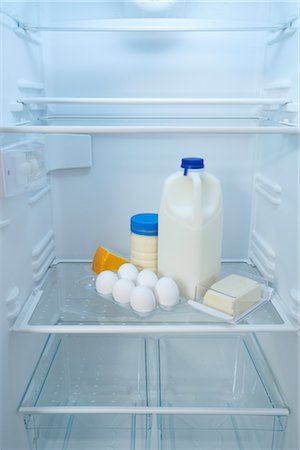 dairy eggs milk cheese - Fridge with Dairy Products and Eggs Stock Photo - Premium Royalty-Free, Code: 600-03406341