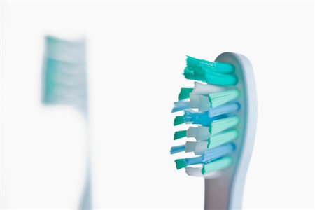 Close-up of Toothbrush Foto de stock - Sin royalties Premium, Código: 600-03403745