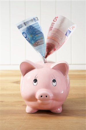 Piggy Bank and Money Stock Photo - Premium Royalty-Free, Code: 600-03445197