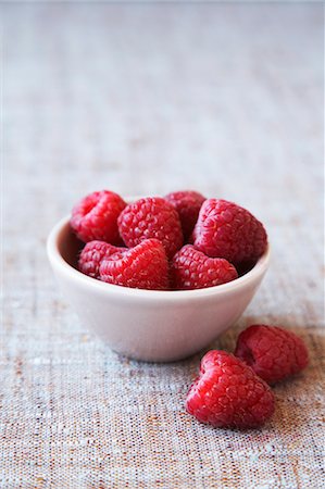 raspberry - Raspberries in Bowl Stock Photo - Premium Royalty-Free, Code: 600-03445427