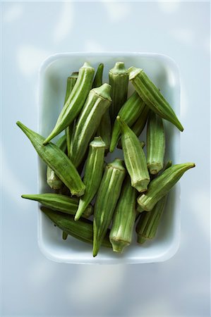 food in containers - Raw Whole Okra in a Styrofoam Container Stock Photo - Premium Royalty-Free, Code: 600-03460464