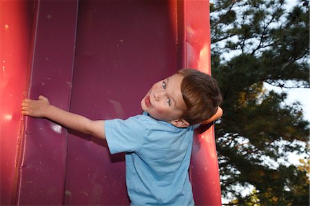 Portrait of Boy Playing Outdoors Stock Photo - Premium Royalty-Free, Code: 600-03485068