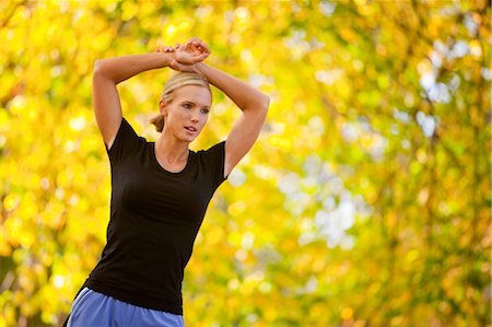 simsearch:700-02245399,k - Woman Stretching in the Park, Seattle, Washington, USA Stock Photo - Premium Royalty-Free, Code: 600-03520582
