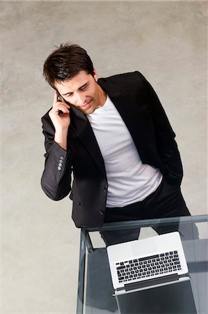 Businessman Talking on Cell Phone Stock Photo - Premium Royalty-Free, Code: 600-03520609