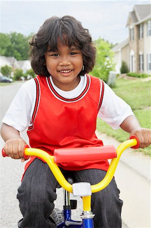 simsearch:600-05653250,k - Little Boy Riding Bike Stock Photo - Premium Royalty-Free, Code: 600-03544737