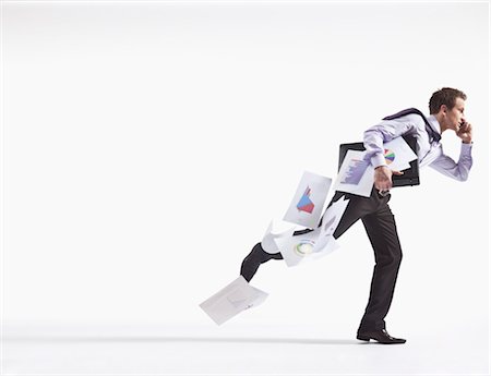 people falling - Hurried Businessman Dropping Papers Foto de stock - Sin royalties Premium, Código: 600-03556584