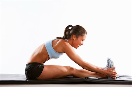 Woman Exercising Stock Photo - Premium Royalty-Free, Code: 600-03563801