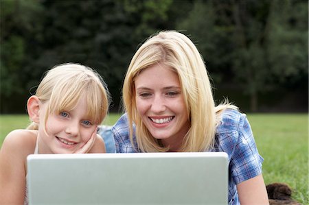 simsearch:600-03601499,k - Mother and Daughter using Laptop Stock Photo - Premium Royalty-Free, Code: 600-03601503