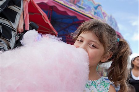 europe theme park - Girl Eating Cotton Candy, Bordeaux, Gironde, Aquitaine, France Stock Photo - Premium Royalty-Free, Code: 600-03615496