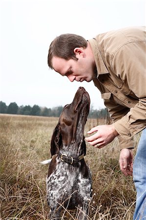 pet owners and their pets - Dog Giving Owner a Kiss, Houston, Texas, USA Stock Photo - Premium Royalty-Free, Code: 600-03644799