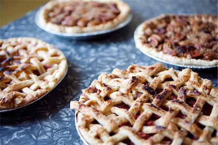 Homemade Pies on Kitchen Table Stock Photo - Premium Royalty-Free, Code: 600-03641258