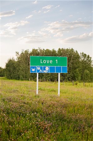 direction sign and nobody road - LOVE 1 Sign, Manitoba, Canada Stock Photo - Premium Royalty-Free, Code: 600-03641260