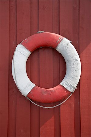 red ropes - Life Ring Hanging on Wall, Vest-Agder, Southern Norway, Norway Stock Photo - Premium Royalty-Free, Code: 600-03682064