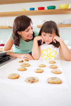 simsearch:600-03601499,k - Mother and Daughter Baking Cookies, Portland, Oregon, USA Stock Photo - Premium Royalty-Free, Code: 600-03696748